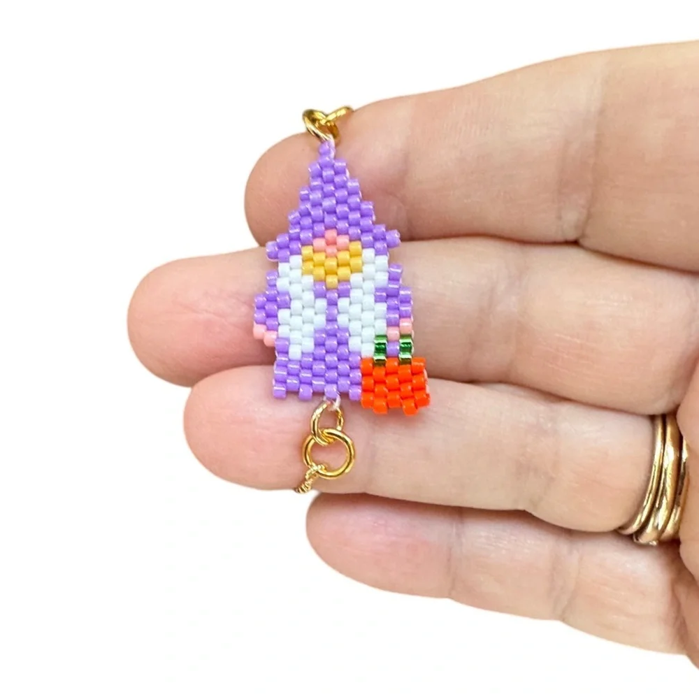 Handcrafted beaded Halloween gnome with pumpkin slider bracelet adjustable